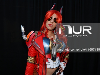 Cosplayer Abigail poses for a photo dressed as Causeway from Transformers for New York Comic Con at the Javits Center in New York City, on O...