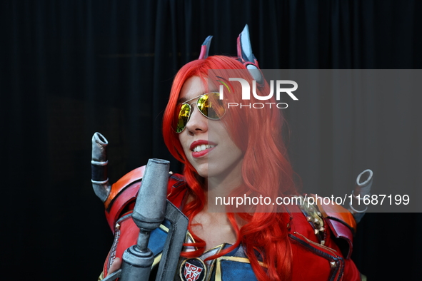 Cosplayer Abigail poses for a photo dressed as Causeway from Transformers for New York Comic Con at the Javits Center in New York City, on O...