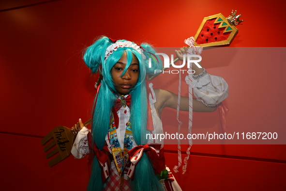 Layla from New Jersey is in character as Strawberry Miku for New York Comic Con at the Javits Center in New York City, on October 20, 2024. 