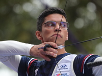 Thomas Chirault of France competes against Woojin Kim of Korea (not in picture) during the Men's recurve quarterfinals match on the final da...