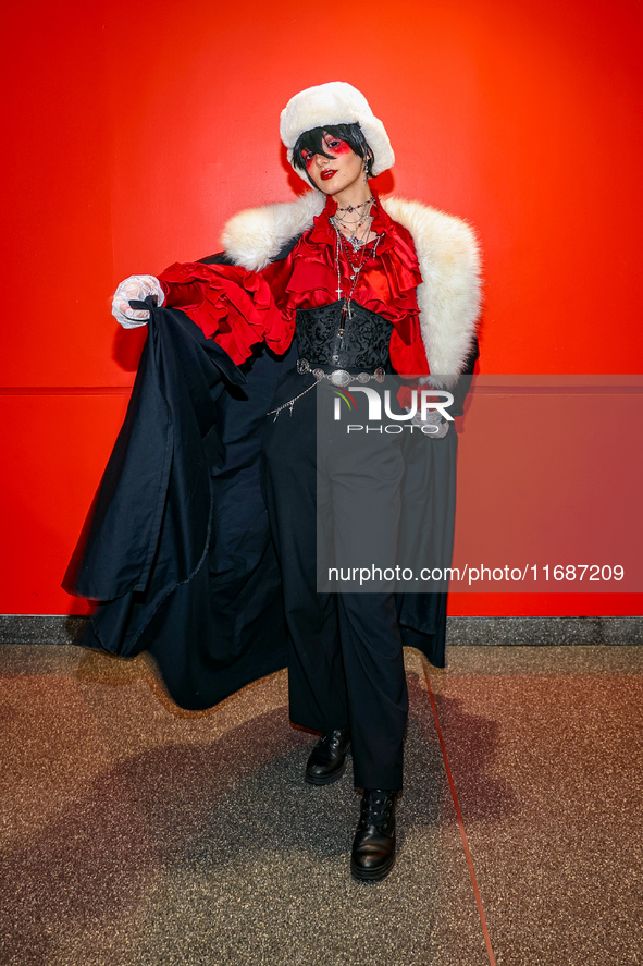 Cosplayer Lisa from Germany portrays Peter Dostoevsky from Bank of Stray Dog for New York Comic Con at the Javits Center in New York City, o...