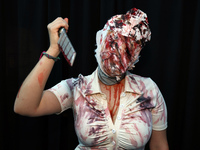 Cosplayer Gabrielle from Rhode Island dresses as the nurse from Silent Hill for New York Comic Con at the Javits Center in New York City, on...