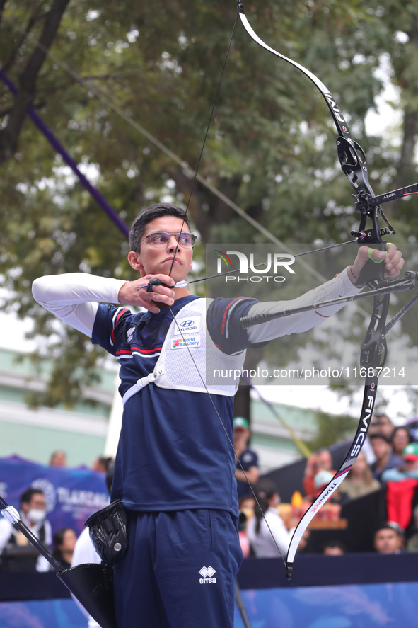 Thomas Chirault of France competes against Woojin Kim of Korea (not in picture) during the Men's recurve quarterfinals match on the final da...