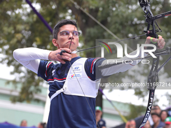 Thomas Chirault of France competes against Woojin Kim of Korea (not in picture) during the Men's recurve quarterfinals match on the final da...