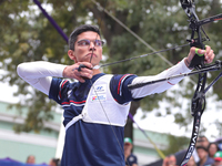 Thomas Chirault of France competes against Woojin Kim of Korea (not in picture) during the Men's recurve quarterfinals match on the final da...