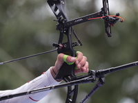 Thomas Chirault of France competes against Woojin Kim of Korea (not in picture) during the Men's recurve quarterfinals match on the final da...