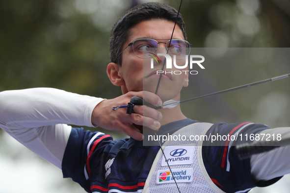 Thomas Chirault of France competes against Woojin Kim of Korea (not in picture) during the Men's recurve quarterfinals match on the final da...