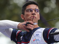 Thomas Chirault of France competes against Woojin Kim of Korea (not in picture) during the Men's recurve quarterfinals match on the final da...