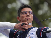 Thomas Chirault of France competes against Woojin Kim of Korea (not in picture) during the Men's recurve quarterfinals match on the final da...