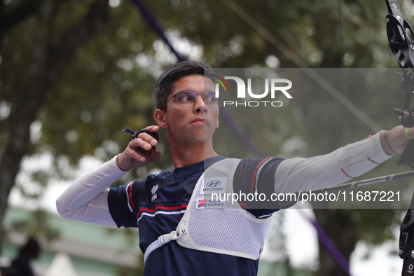 Thomas Chirault of France competes against Woojin Kim of Korea (not in picture) during the Men's recurve quarterfinals match on the final da...