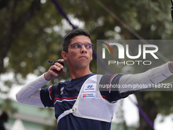 Thomas Chirault of France competes against Woojin Kim of Korea (not in picture) during the Men's recurve quarterfinals match on the final da...