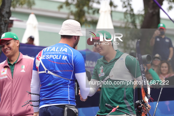 Matias Grande of Mexico and Mauro Nespoli of Italy compete during the Men's recurve quarterfinals match on the final day of the Tlaxcala 202...