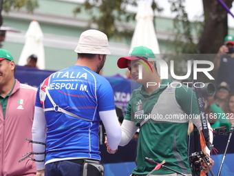 Matias Grande of Mexico and Mauro Nespoli of Italy compete during the Men's recurve quarterfinals match on the final day of the Tlaxcala 202...