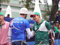 Matias Grande of Mexico and Mauro Nespoli of Italy compete during the Men's recurve quarterfinals match on the final day of the Tlaxcala 202...