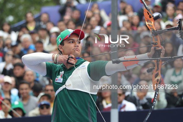 Matias Grande of Mexico competes against Mauro Nespoli of Italy (not in picture) during the Men's recurve quarterfinals match on the final d...