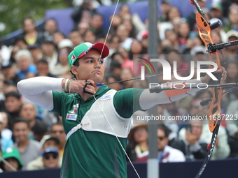 Matias Grande of Mexico competes against Mauro Nespoli of Italy (not in picture) during the Men's recurve quarterfinals match on the final d...