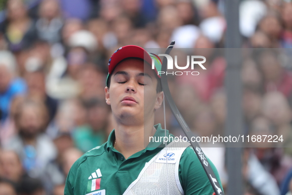 Matias Grande of Mexico competes against Mauro Nespoli of Italy (not in picture) during the Men's recurve quarterfinals match on the final d...