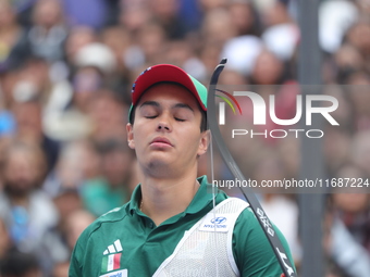 Matias Grande of Mexico competes against Mauro Nespoli of Italy (not in picture) during the Men's recurve quarterfinals match on the final d...