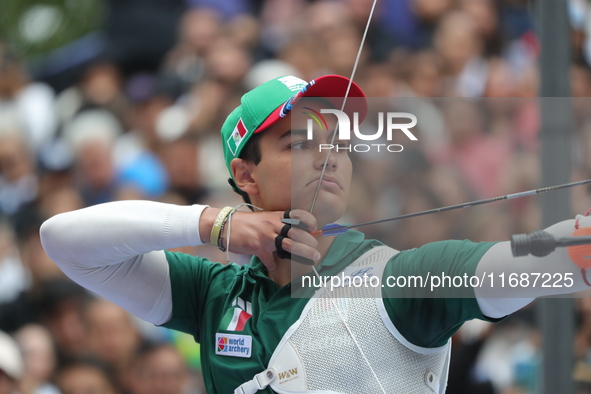 Matias Grande of Mexico competes against Mauro Nespoli of Italy (not in picture) during the Men's recurve quarterfinals match on the final d...