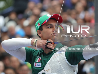 Matias Grande of Mexico competes against Mauro Nespoli of Italy (not in picture) during the Men's recurve quarterfinals match on the final d...