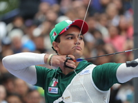 Matias Grande of Mexico competes against Mauro Nespoli of Italy (not in picture) during the Men's recurve quarterfinals match on the final d...