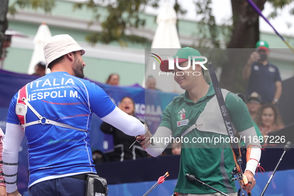 Matias Grande of Mexico and Mauro Nespoli of Italy compete during the Men's recurve quarterfinals match on the final day of the Tlaxcala 202...