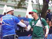 Matias Grande of Mexico and Mauro Nespoli of Italy compete during the Men's recurve quarterfinals match on the final day of the Tlaxcala 202...