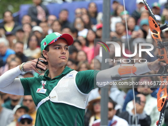 Matias Grande of Mexico competes against Mauro Nespoli of Italy (not in picture) during the Men's recurve quarterfinals match on the final d...