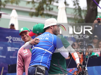 Matias Grande of Mexico and Mauro Nespoli of Italy compete during the Men's recurve quarterfinals match on the final day of the Tlaxcala 202...