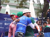 Matias Grande of Mexico and Mauro Nespoli of Italy compete during the Men's recurve quarterfinals match on the final day of the Tlaxcala 202...