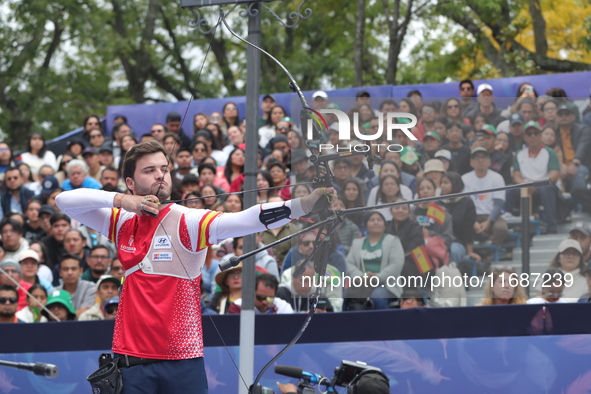 Andres Temino of Spain competes against Marcus D'Almeida of Brazil (not in picture) during the Men's recurve quarterfinals match on the fina...