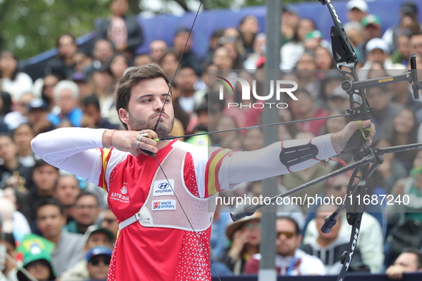 Andres Temino of Spain competes against Marcus D'Almeida of Brazil (not in picture) during the Men's recurve quarterfinals match on the fina...