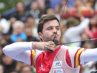 Andres Temino of Spain competes against Marcus D'Almeida of Brazil (not in picture) during the Men's recurve quarterfinals match on the fina...