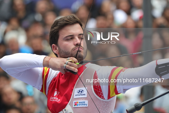 Andres Temino of Spain competes against Marcus D'Almeida of Brazil (not in picture) during the Men's recurve quarterfinals match on the fina...