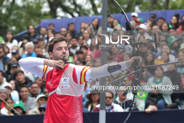 Andres Temino of Spain competes against Marcus D'Almeida of Brazil (not in picture) during the Men's recurve quarterfinals match on the fina...