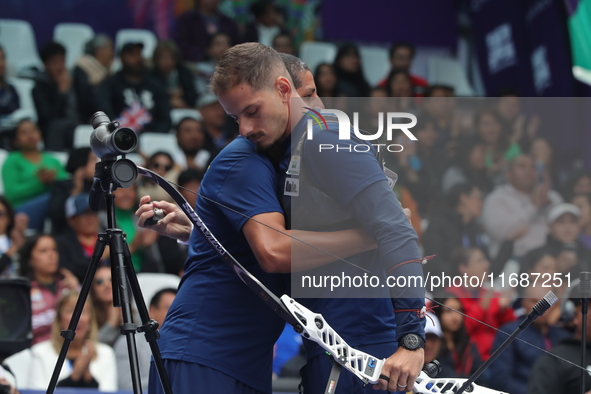 Marcus D'Almeida of Brazil competes against Andres Temino of Spain (not in picture) during the Men's recurve quarterfinals match on the fina...