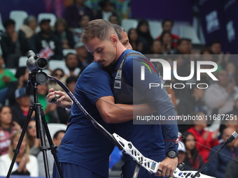 Marcus D'Almeida of Brazil competes against Andres Temino of Spain (not in picture) during the Men's recurve quarterfinals match on the fina...