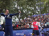 Marcus D'Almeida of Brazil and Andres Temino of Spain compete during the Men's recurve quarterfinals match on the final day of the Tlaxcala...