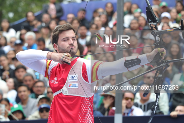 Andres Temino of Spain competes against Marcus D'Almeida of Brazil (not in picture) during the Men's recurve quarterfinals match on the fina...