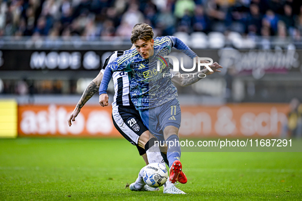 AFC Ajax Amsterdam forward Mika Godts plays during the match between Heracles Almelo and Ajax at the Asito Stadium for the Dutch Eredivisie...