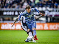 AFC Ajax Amsterdam forward Mika Godts plays during the match between Heracles Almelo and Ajax at the Asito Stadium for the Dutch Eredivisie...