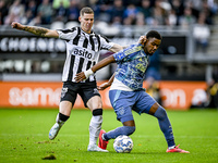 Heracles Almelo forward Suf Podgoreanu and AFC Ajax Amsterdam defender Jorrel Hato play during the match between Heracles Almelo and Ajax at...