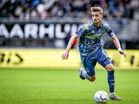 AFC Ajax Amsterdam midfielder Kenneth Taylor plays during the match between Heracles Almelo and Ajax at the Asito Stadium for the Dutch Ered...