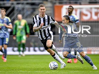 Heracles Almelo forward Suf Podgoreanu and AFC Ajax Amsterdam midfielder Kian Fitz-Jim play during the match between Heracles Almelo and Aja...