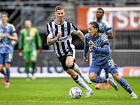 Heracles Almelo forward Suf Podgoreanu and AFC Ajax Amsterdam midfielder Kian Fitz-Jim play during the match between Heracles Almelo and Aja...