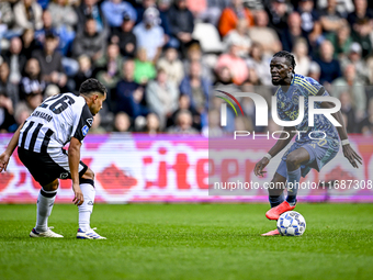 Heracles Almelo midfielder Daniel van Kaam and AFC Ajax Amsterdam forward Bertrand Traore play during the match between Heracles Almelo and...