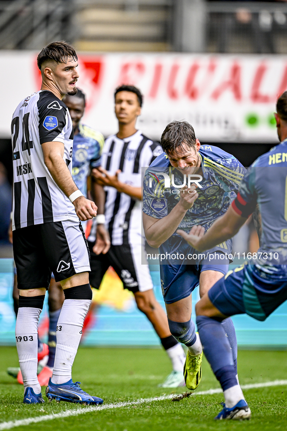 Heracles Almelo defender Ivan Mesik and AFC Ajax Amsterdam forward Wout Weghorst celebrate a goal during the match between Heracles Almelo a...