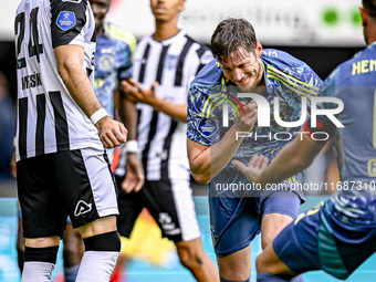 Heracles Almelo defender Ivan Mesik and AFC Ajax Amsterdam forward Wout Weghorst celebrate a goal during the match between Heracles Almelo a...