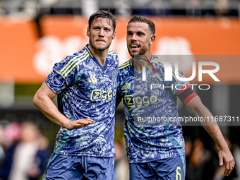 AFC Ajax Amsterdam forward Wout Weghorst and AFC Ajax Amsterdam midfielder Jordan Henderson celebrate the 2-3 goal during the match between...