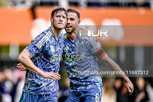 AFC Ajax Amsterdam forward Wout Weghorst and AFC Ajax Amsterdam midfielder Jordan Henderson celebrate the 2-3 goal during the match between...